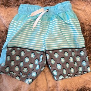 NWOT Boys Wave Zone blue and grey swim trunks.